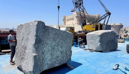 The giant stone blocks of the Alexandria Lighthouse  lifted from the sea bed